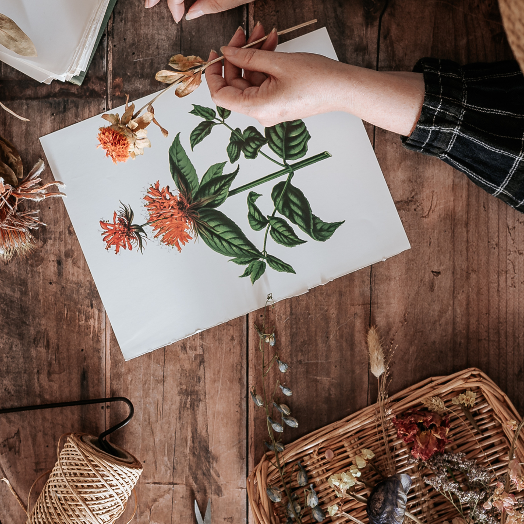 Person making a flower painting
