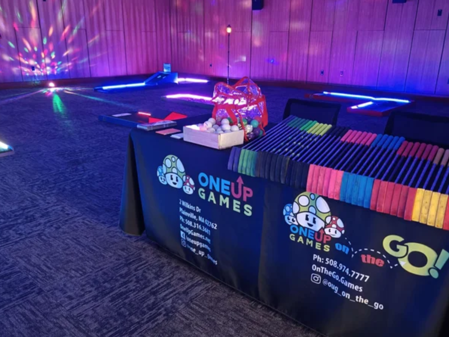 LED Mini Golf flyer with image of course and OneUP Games table.