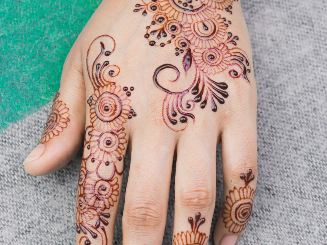 Teen henna flier with image of henna tattoo on hand